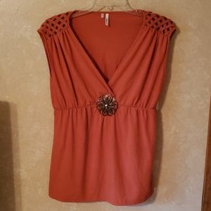 Orange sleeveless tank with embelshment